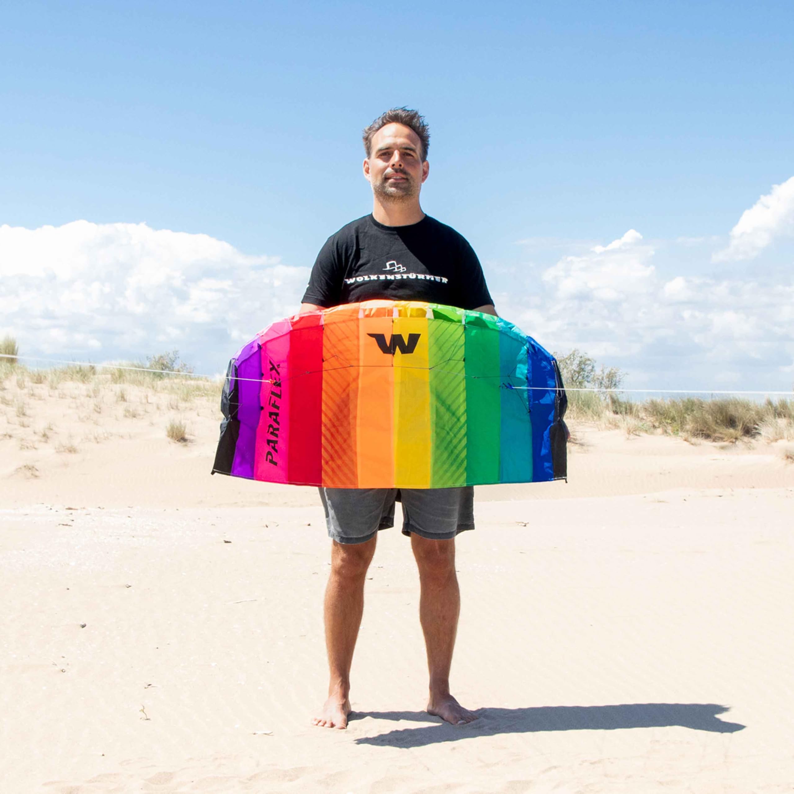 Wolkenstürmer Paraflex Basic Lenkmatte 1.2 (Rainbow) - Regenbogen Kite für Kinder ab 6 Jahre - Lenkdrachen flugfertig mit 2x25m Dyneemaleinen & Flugschlaufen